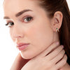 V-Shaped Emerald And Diamond Curl Earrings Yellow Gold