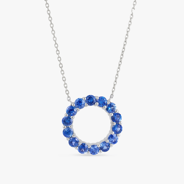 Large Blue Sapphire Circle Pendant White Gold